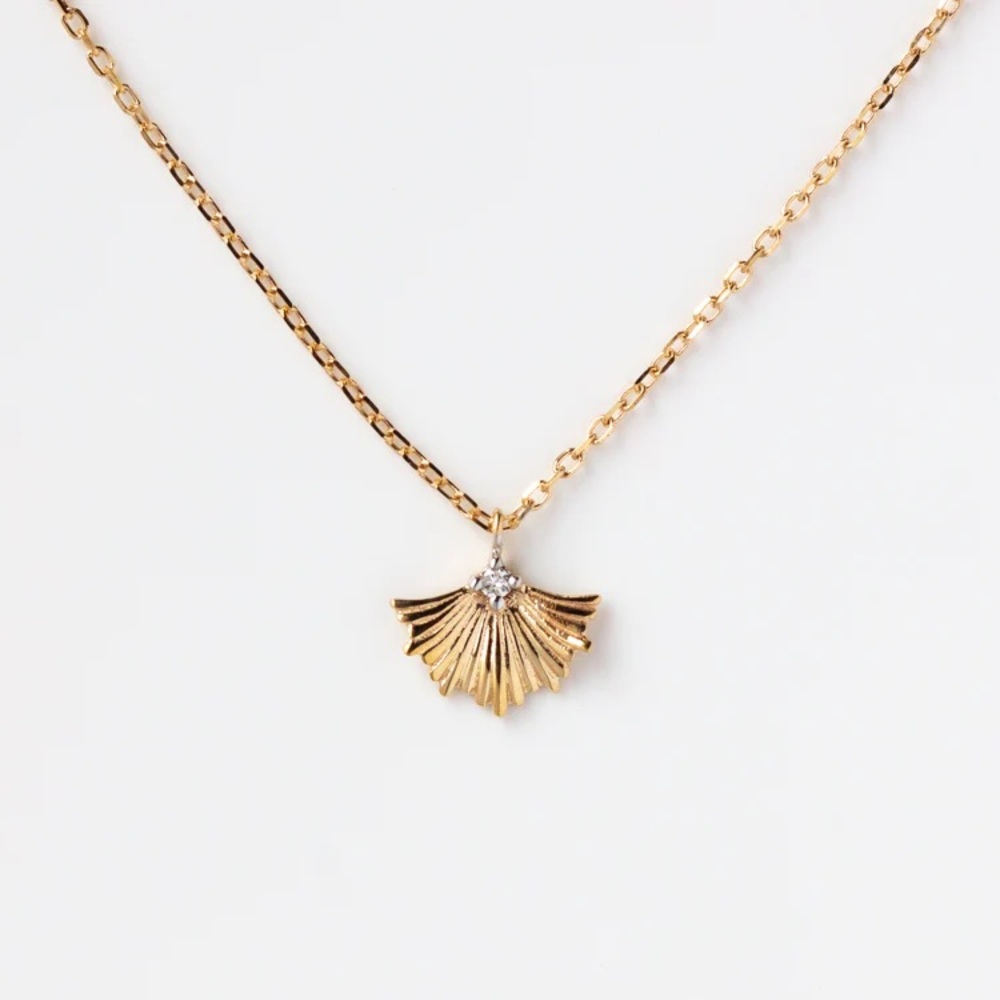 local eclectic solid yellow gold and diamond ginkgo leaf necklace!